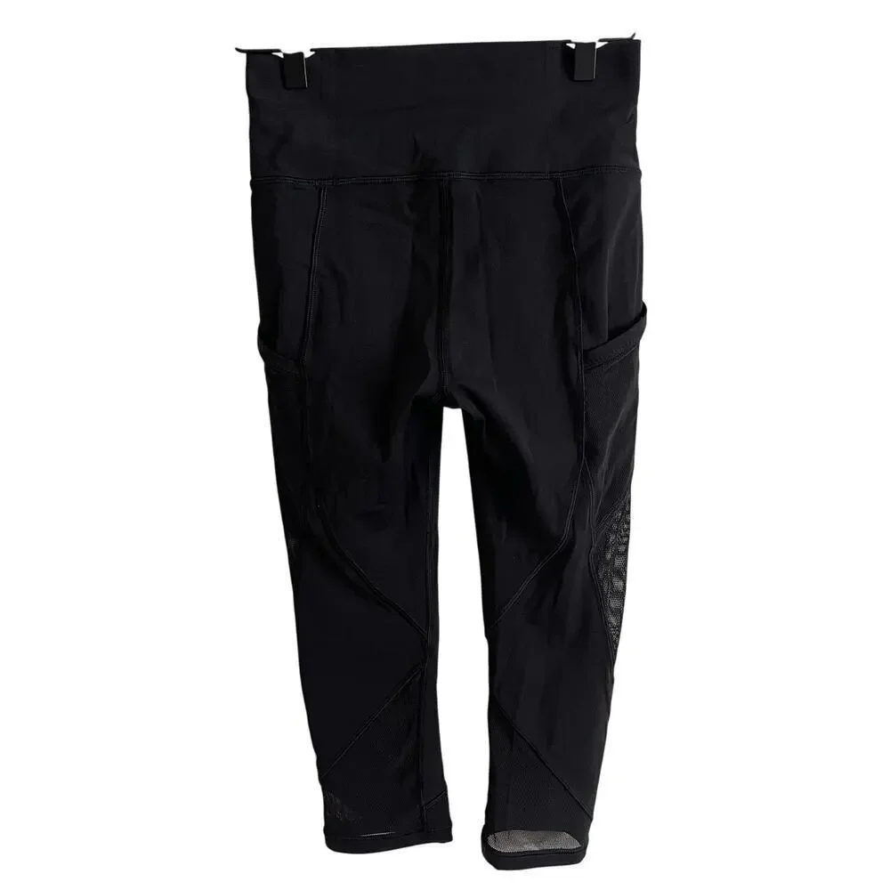 Lululemon Black Cropped Leggings Mesh Inserts Pockets Size 4